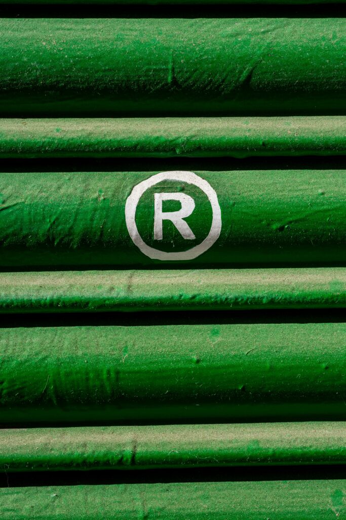 Close-up of green shutter with registered trademark symbol in white.